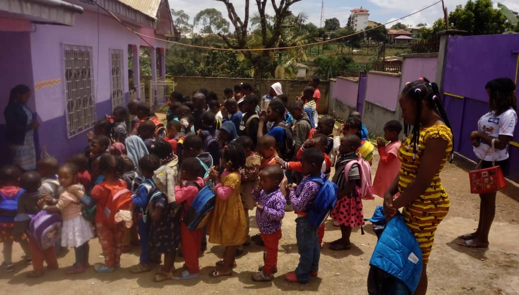 Pupils at morning assembly on the NECIBNAPS campus